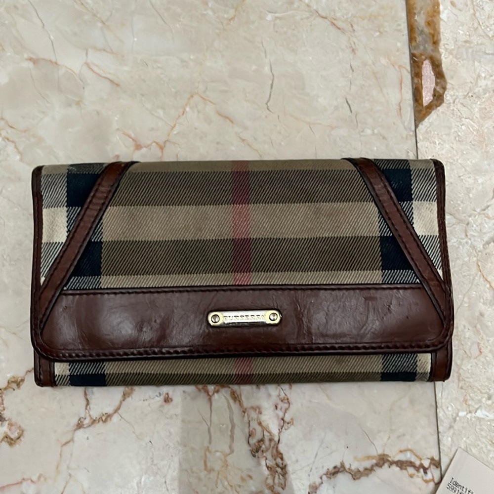 Burberry Wallet with original box and dust bag.